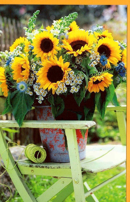 Blankokarte Sonnenblumen im Gartenstuhl – Charmante Grußkarte für jeden Anlass