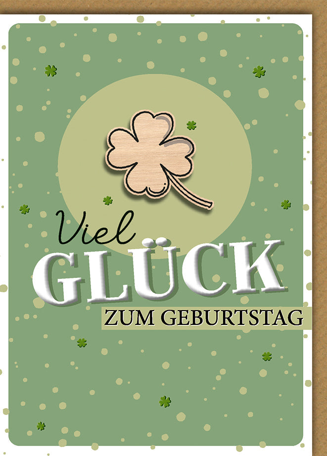 Geburtstagskarte Viel Glück – Holz-Kleeblatt auf grünem Punktmuster mit Streuseln