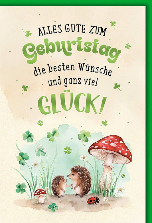 Geburtstagskarte Kinder – Igel mit Fliegenpilz und Kleeblättern in Aquarelloptik