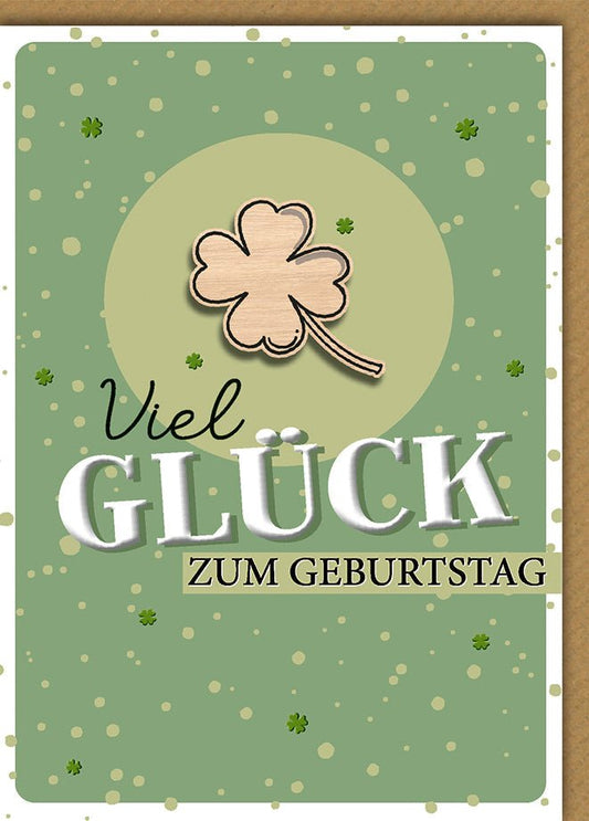 Geburtstagskarte Viel Glück – Holz - Kleeblatt auf grünem Punktmuster mit Streuseln