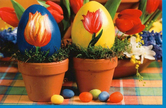 Osterkarte mit blauen und gelben Eiern – Frühlingsgrüße in leuchtenden Farben