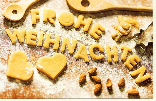 Weihnachtsgrußkarte mit Teigbuchstaben - Frohe Weihnachten in köstlicher Optik