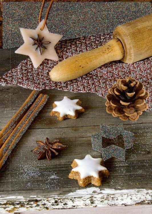 Weihnachtspostkarte mit Lebkuchensternen und Tannenzapfen - Motiv