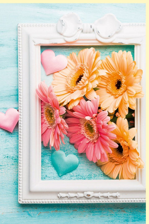 Blankokarte mit Naturmotiv: Gerbera in Orange & Rosa, Herzdeko, Pastellfarben für Frühling & Sommer, ideal für Freundschaft und Liebe