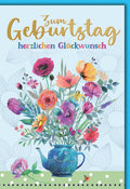 Geburtstagskarte Blumen – Bunte Aquarellblüten in blauer Gießkanne mit Goldschrift