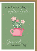 Geburtstagskarte Frauen – Rosa Gießkanne mit Blumen und verspieltem Design