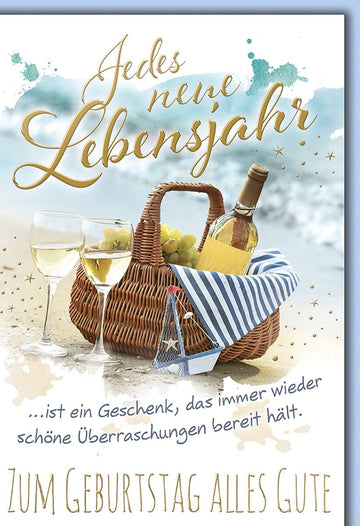 Geburtstagskarte Strandmotiv – Picknickkorb mit Weinflasche und maritimen Akzenten