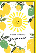 Genesungskarte Fröhlich – Strahlende Sonne mit Zitronen und handgeschriebenem Schriftzug