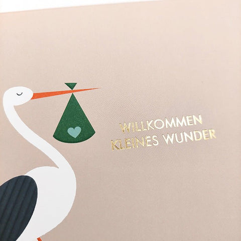 Glückwunschkarte zur Geburt Storch mit Baby Willkommen kleines Wunder moderne Doppelkarte für Neugeborene und frischgebackene Eltern