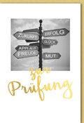 Glückwunschkarte zur Prüfung mit Wegweiser Motiv und goldener Schrift Zukunft Erfolg Mut Glück Applaus Freude
