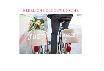 Hochzeitskarte "Just Married" Fahrrad - Romantische Glückwünsche für das Brautpaar mit Blumenstrauß zur Hochzeit