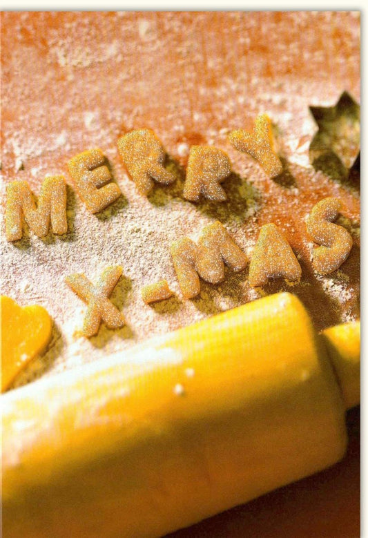Traditionelle Weihnachtskarte "Merry X - Mas" – Festliches Design mit Plätzchenteig und Zuckerdekoration für besinnliche Grüße