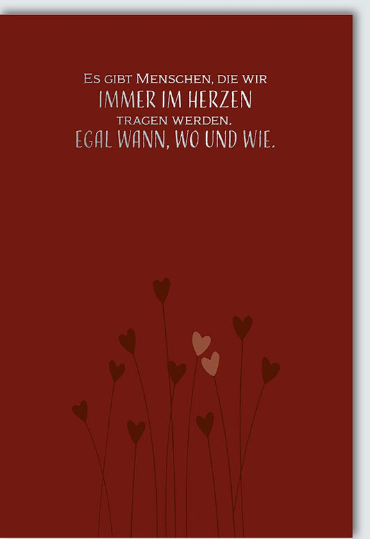Trauerkarte - Menschen, die wir im Herzen tragen: Rote Karte mit Herz - und Blumenmotiven