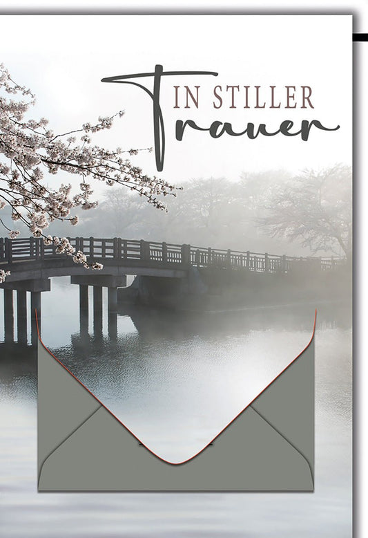 Trauerkarte Natur – Brücke im Nebel mit Kirschblüten und stilvollem Design