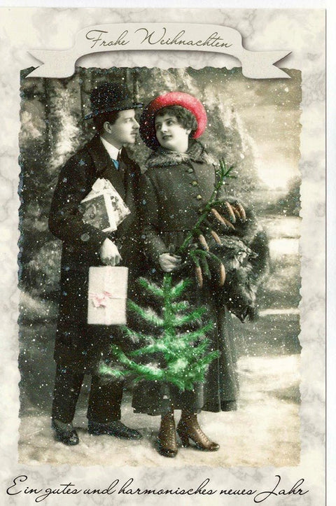 Weihnachtsgrußkarte im Retro - Stil mit Vintage - Paar und Weihnachtsbaum - Motiv