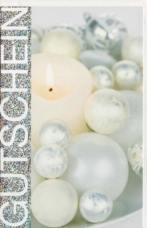 Weihnachtsgrußkarte mit glänzender Silberfolie und funkelnder Kerze