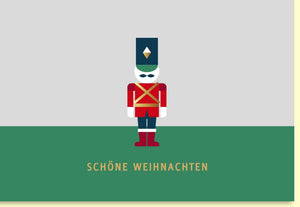 Weihnachtskarte mit festlichem Nussknacker in strahlenden Farben