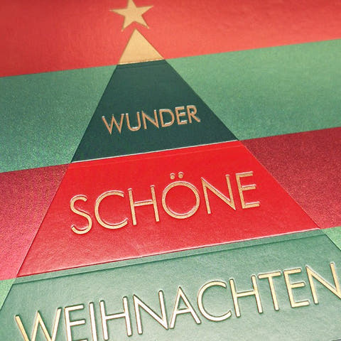 Weihnachtskarte mit festlichem Tannenbaum in leuchtenden Farben