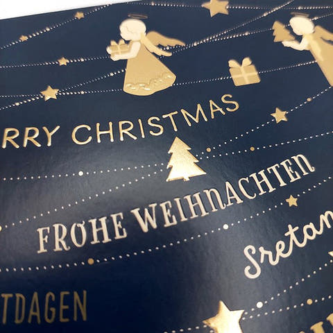 Weihnachtskarte mit goldenen Engeln und funkelnden Sternen im festlichen Glanz