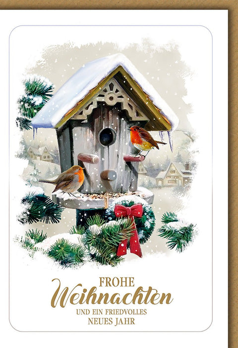 Weihnachtskarte Tiere – Rotkehlchen am Vogelhaus mit verschneiter Winterlandschaft