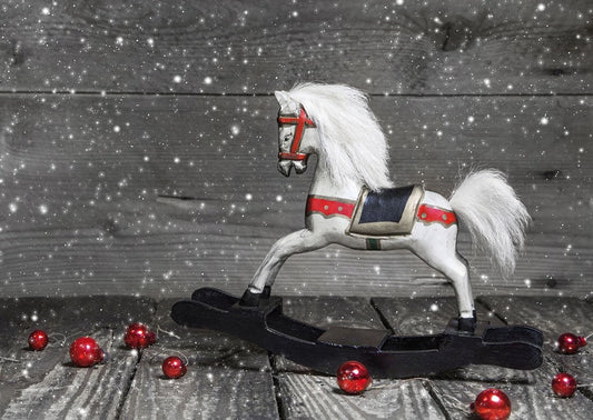 Weihnachtspostkarte mit weißem Schaukelpferd - Festliche Grüße zur Weihnachtszeit